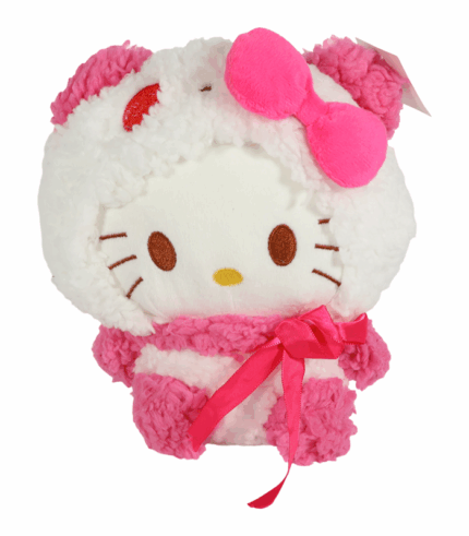 vestida con un traje de invierno esponjoso de material sherpa rosa y blanco