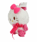 con un gran lazo fucsia en la cabeza.