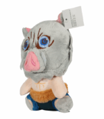 ojos bordados azules y cuerpo de tela color piel con atuendo azul y marrón.